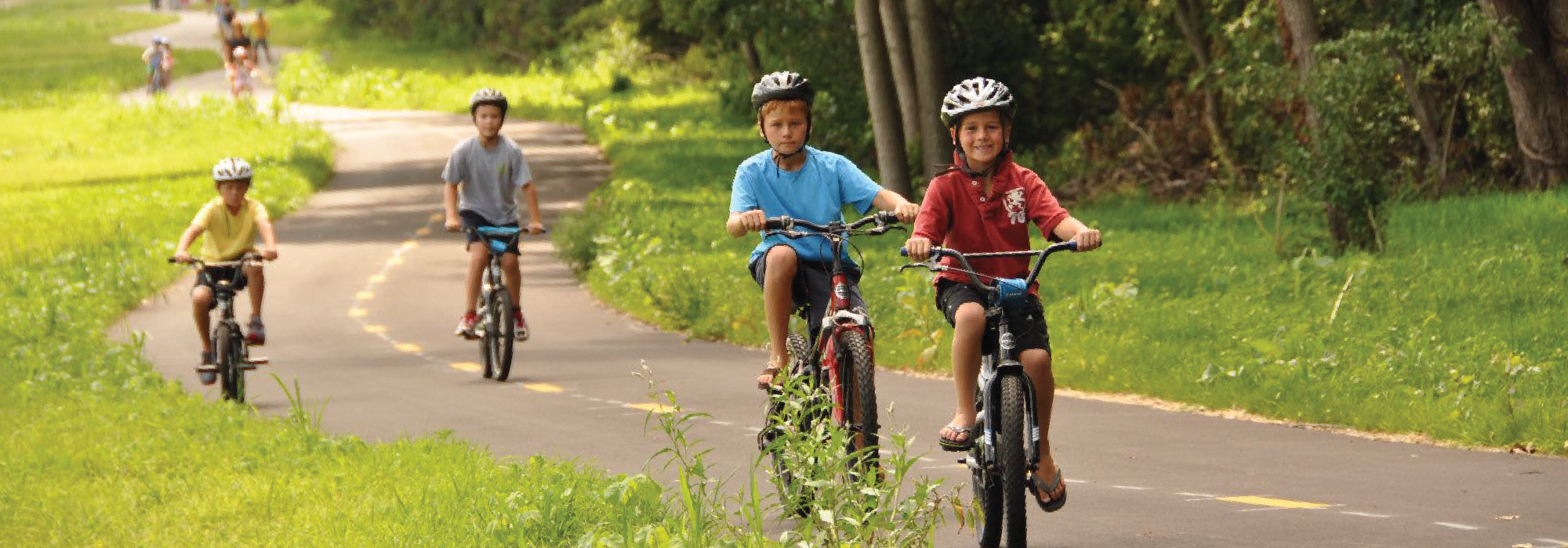 PHP's Foundation's Vision for a Healthier Indiana: Kids riding bikes on Fort Wayne Trails
